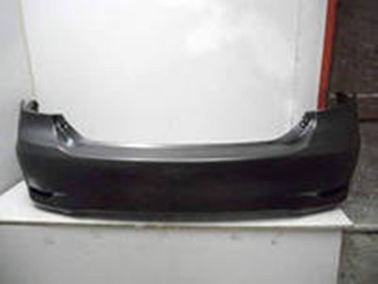Бампер задний TOYOTA COROLLA 2011- SDN