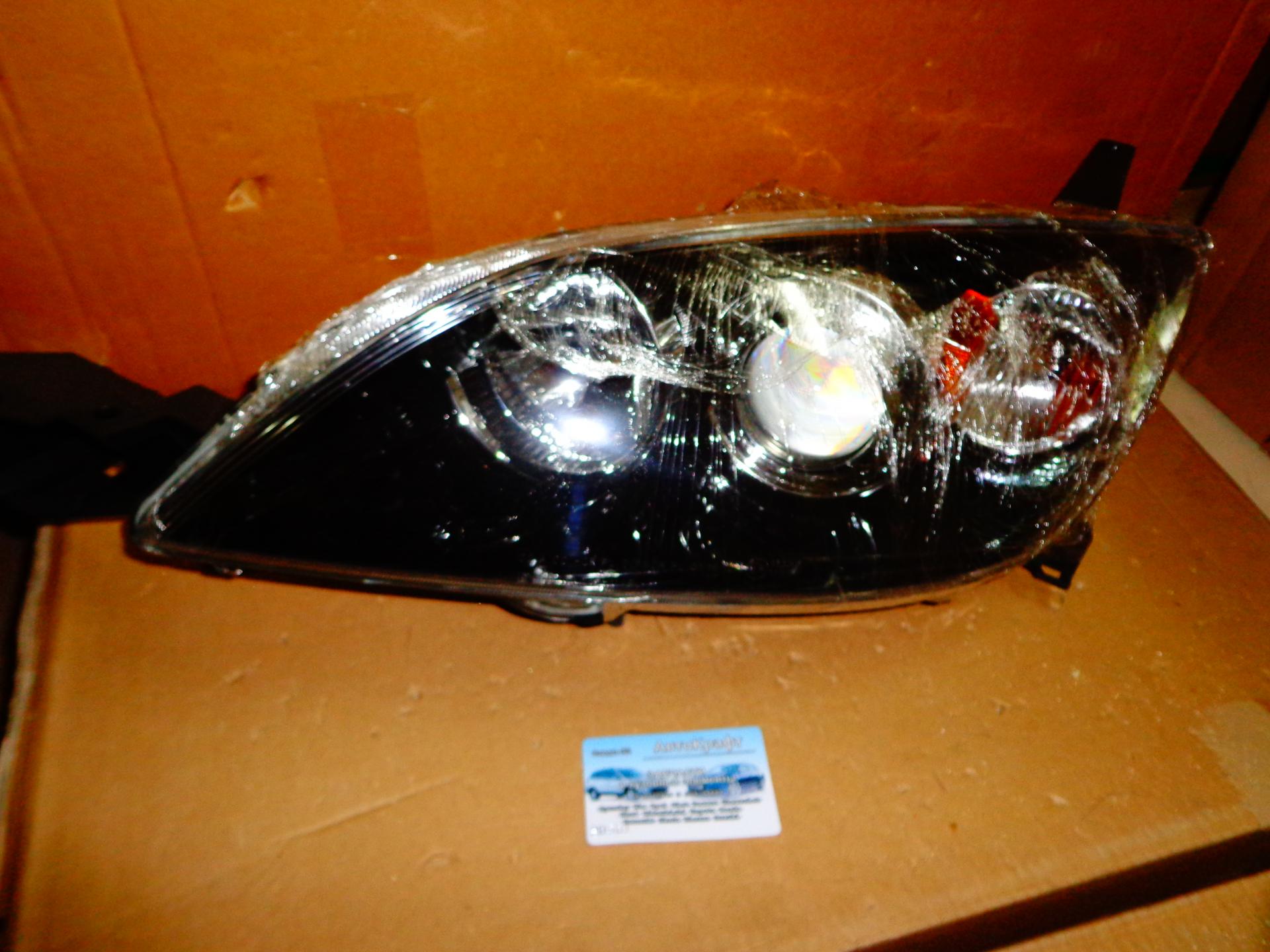 Фара левая Mazda 3 H/B