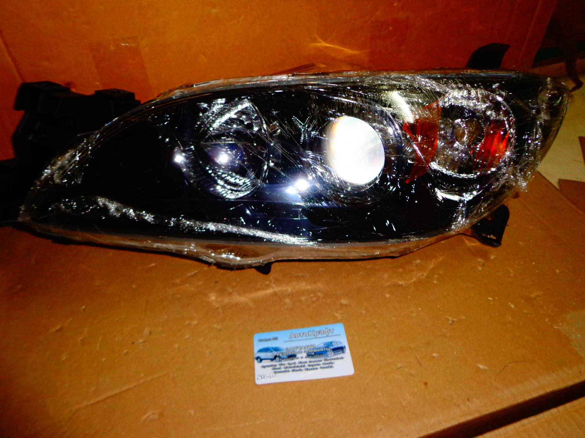 Фара левая Mazda 3 SDN