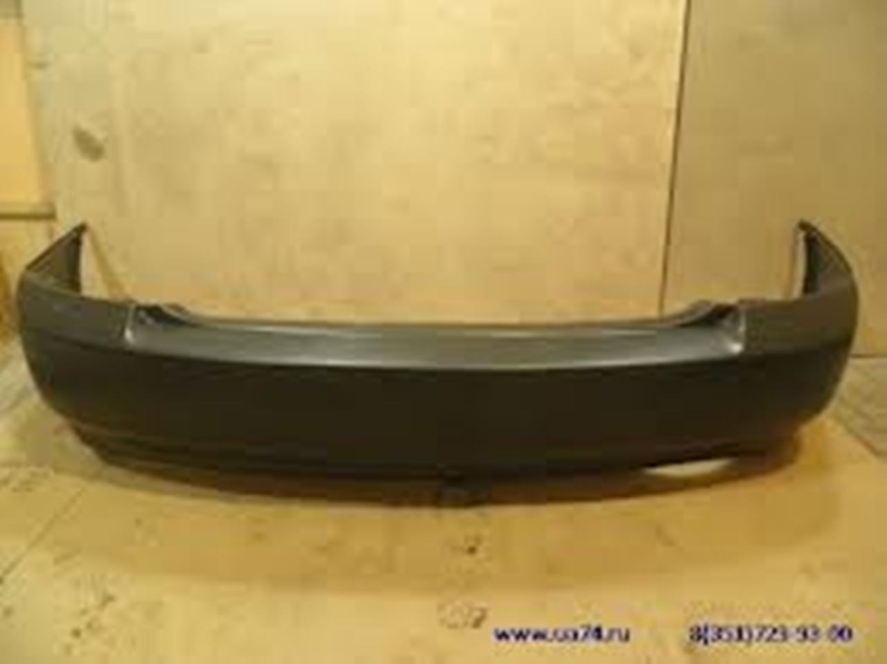 Бампер задний Kia Cerato 2005- SDN
